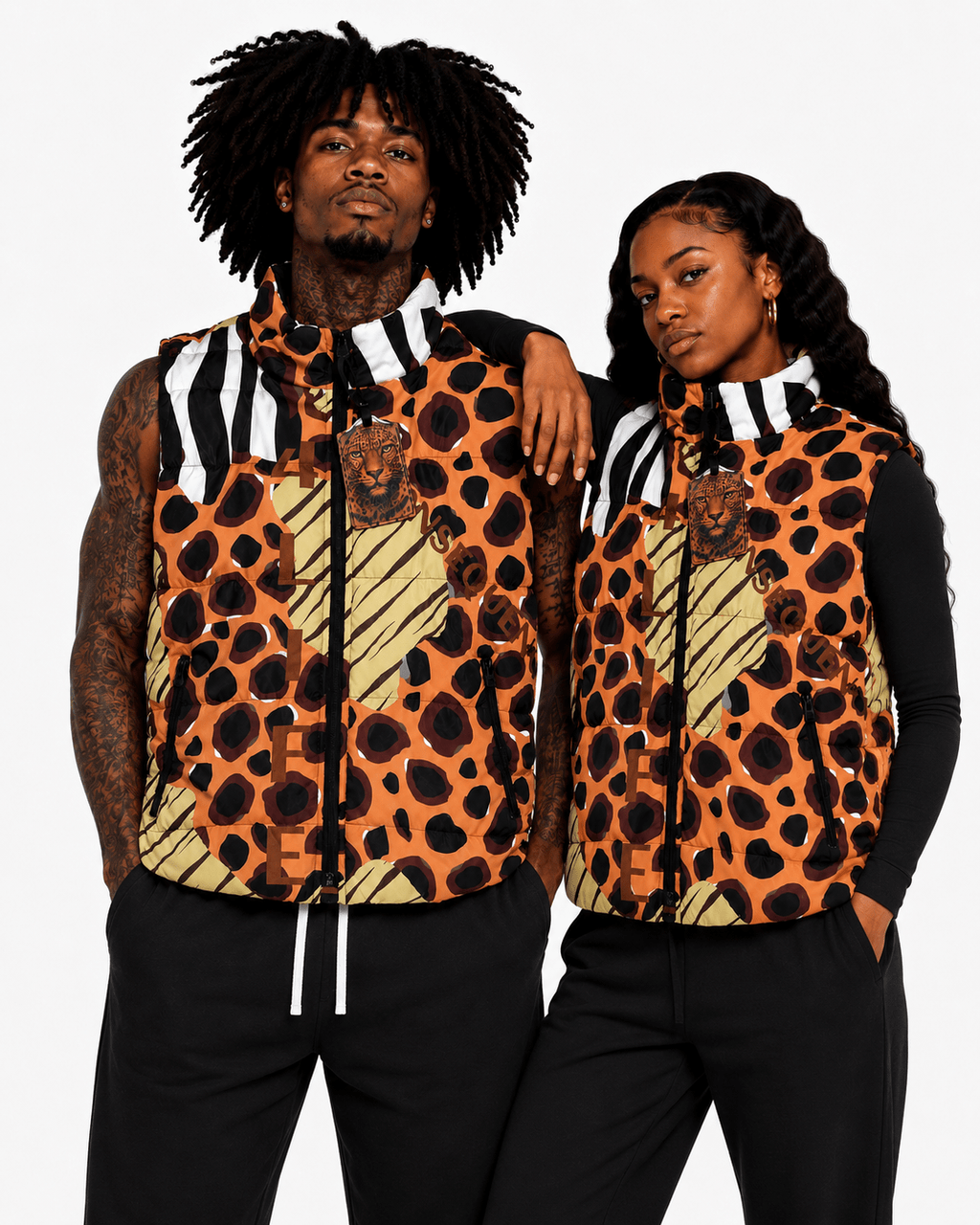 Two people wearing matching leopard print jackets on a white background
