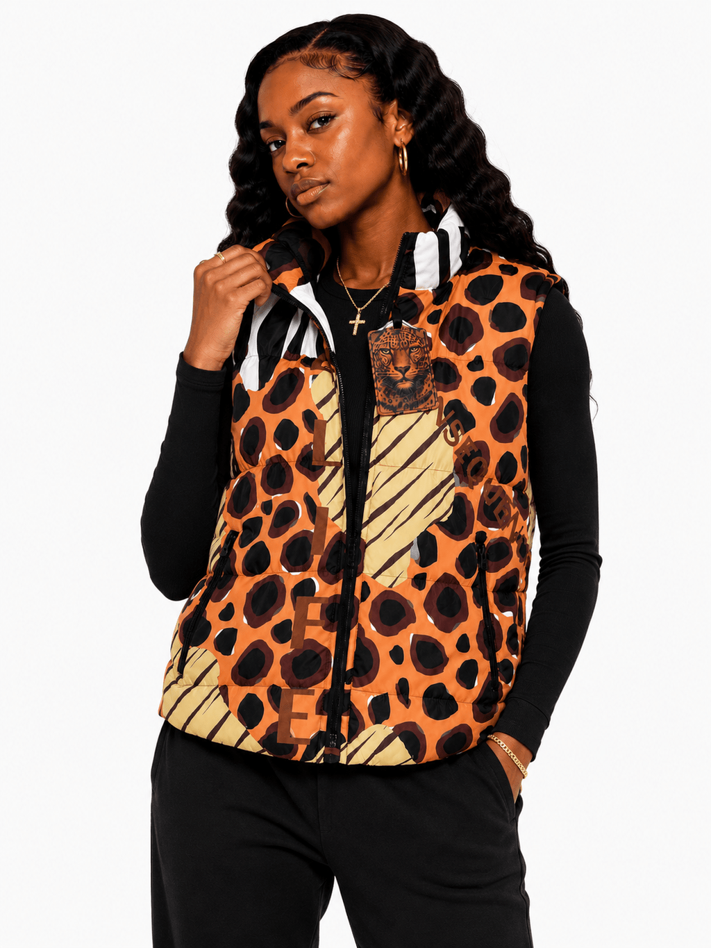 Person wearing a leopard print vest with a white background