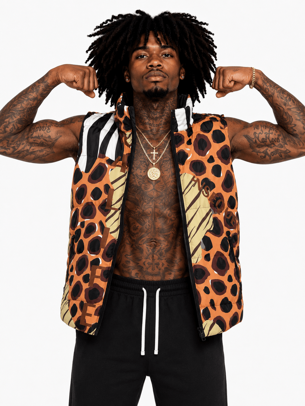 Man flexing muscles wearing a patterned vest on a white background