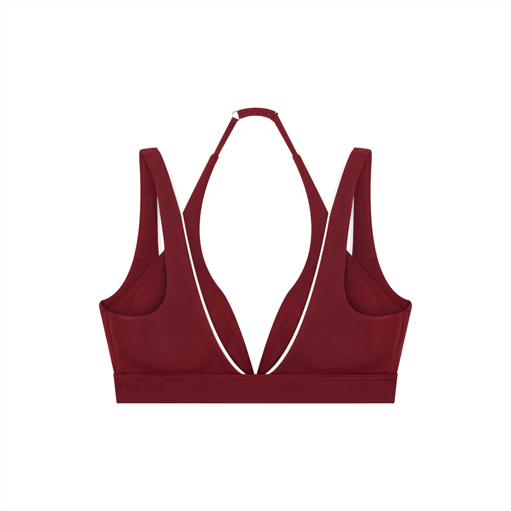 Red sports bra on a white background