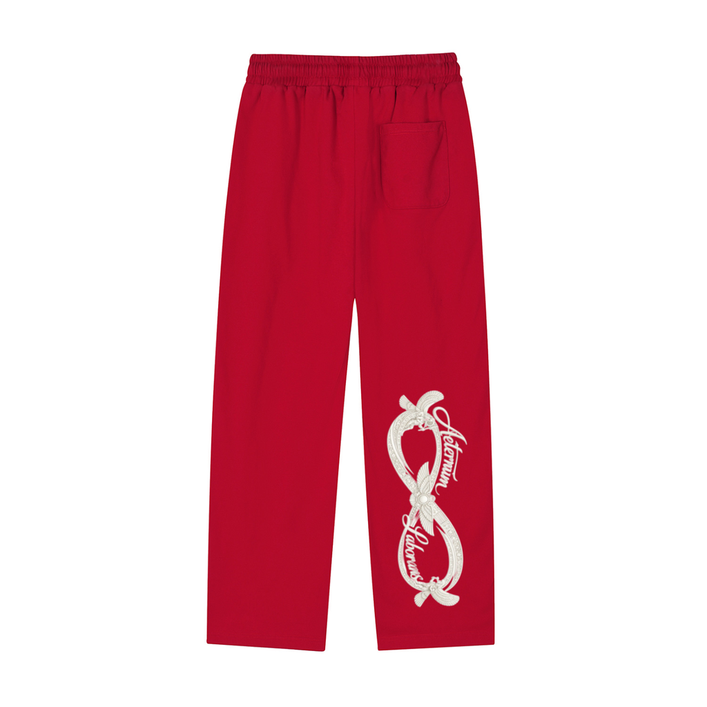 Red pants with a white logo on a white background