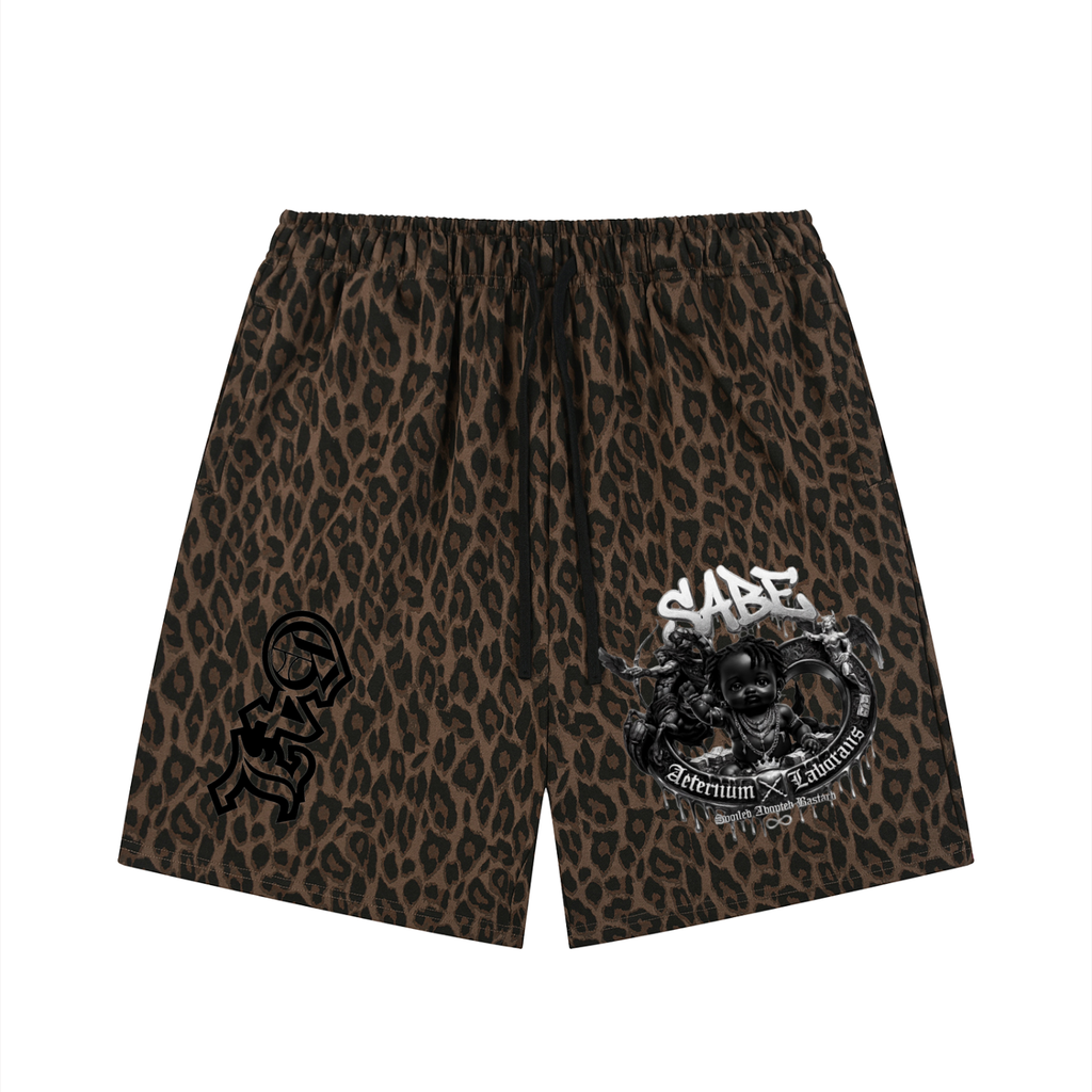 Leopard print shorts with graphic designs on a white background