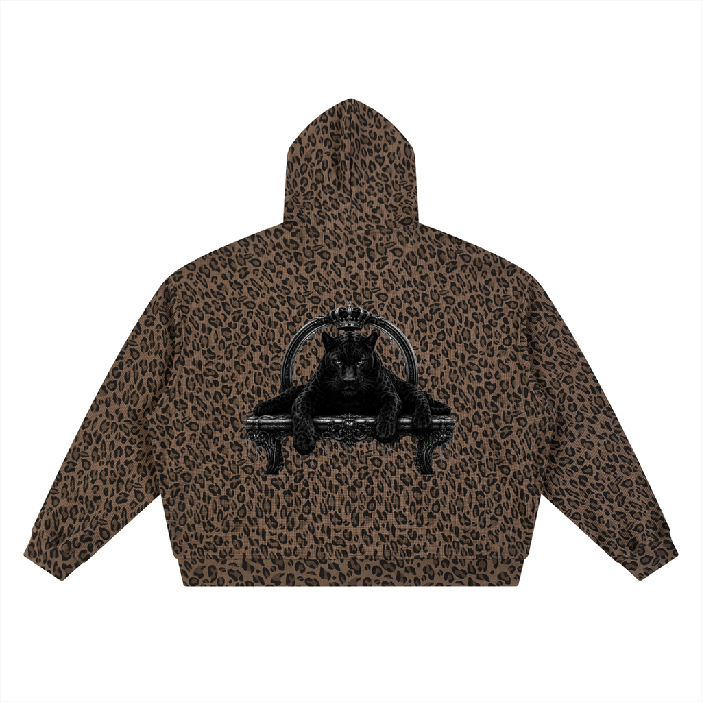 Leopard print hoodie with a black graphic design on a white background